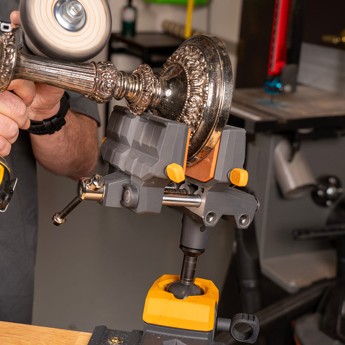 The IQ Vise System holding a metal pipe.